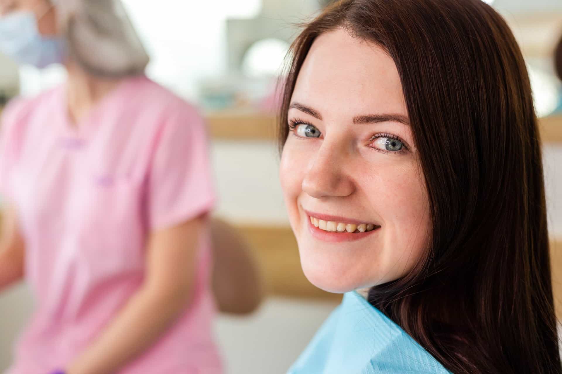 teenage girl receiving orthodontic treatment